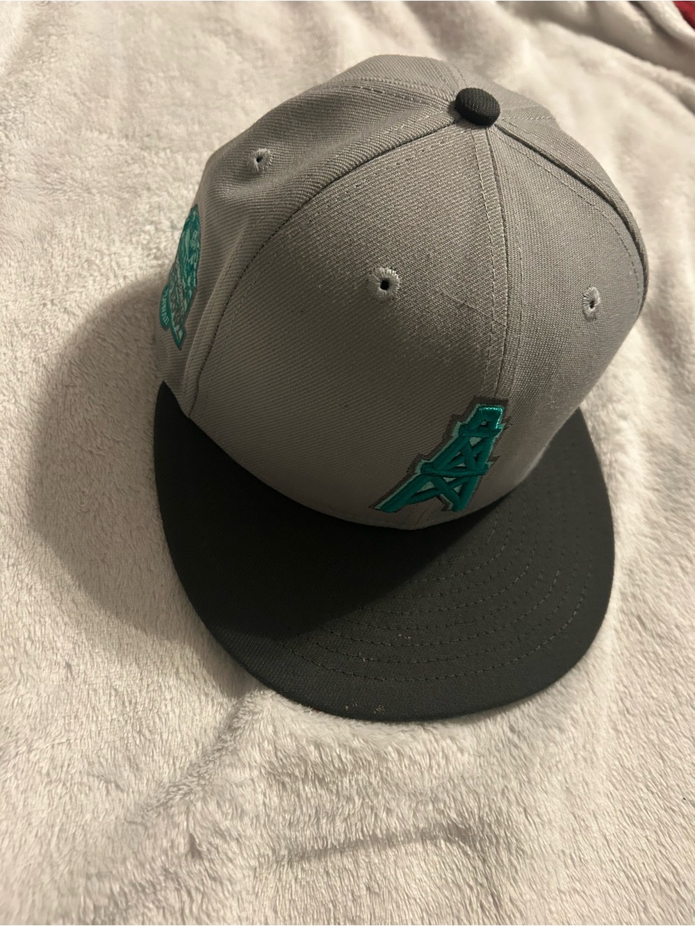 New Era Gray and Black Snapback with Teal Logo